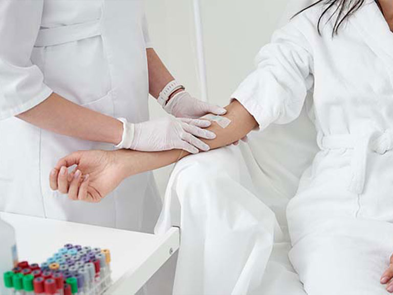 Patient recieving Regen wellness iv at Revive Regenerative Medical Group in Newport Beach for joint pain relief