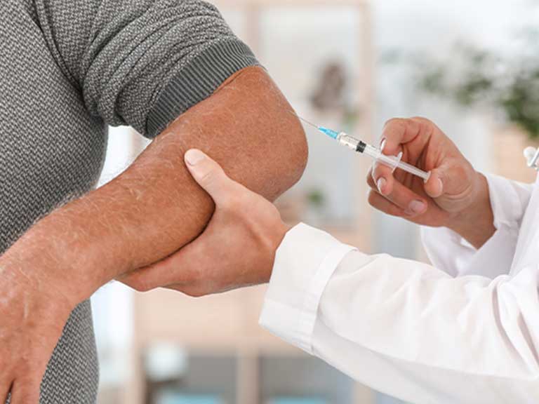 Patient recieving Trigger Point Injections at Revive Regenerative Medical Group in Newport Beach for joint pain relief